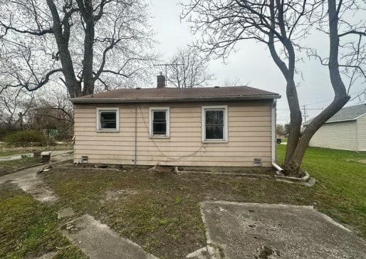 14717 E Riverside Dr, South Holland, IL 60473 - view of side of property with a chimney