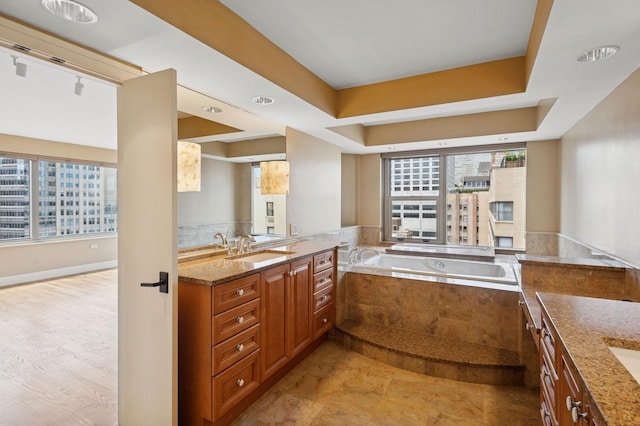 247 E Chestnut St Unit 2303, Chicago, IL 60611 - full bathroom featuring vanity, healthy amount of natural light, and a garden tub