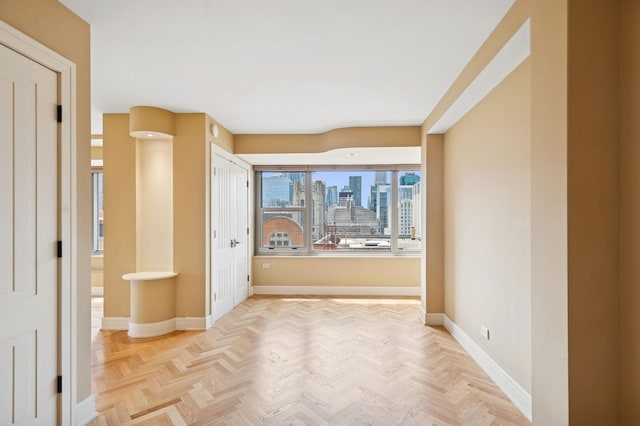 247 E Chestnut St Unit 2303, Chicago, IL 60611 - hall with baseboards and a view of skyline