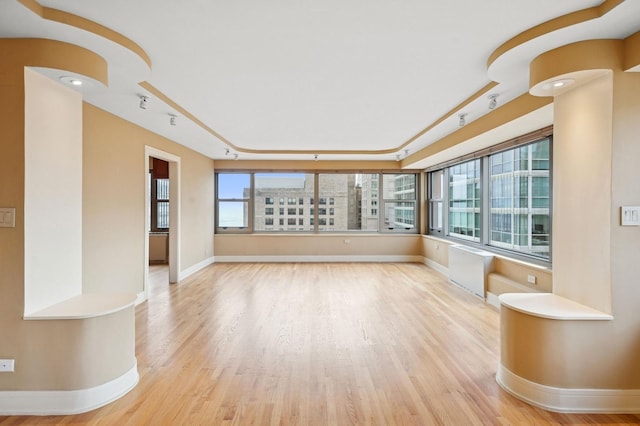 247 E Chestnut St Unit 2303, Chicago, IL 60611 - unfurnished sunroom featuring radiator