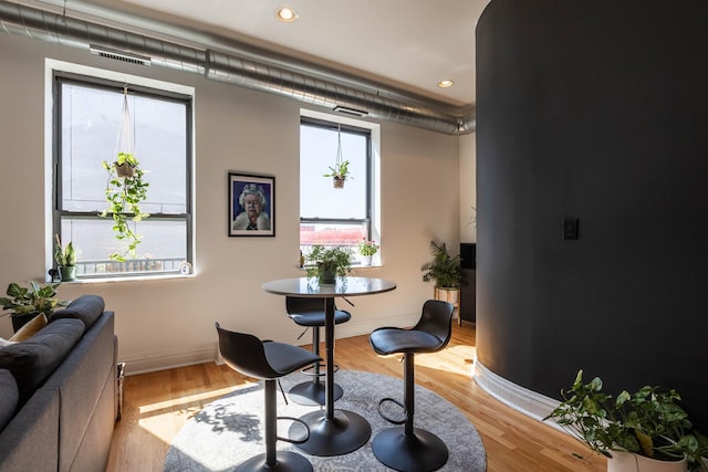 dining space featuring visible vents, recessed lighting, baseboards, and light wood-type flooring