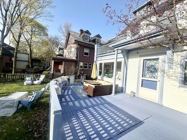 1833 Asbury Ave, Evanston, IL 60201 - rear view of house with outdoor lounge area, fence, and a balcony