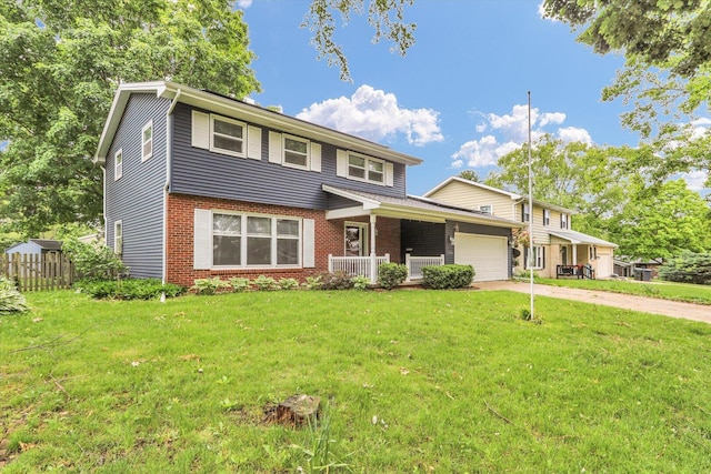 2506 S Cottage Grove Ave, Urbana, IL 61801 - view of front of property with a garage, driveway, and brick siding