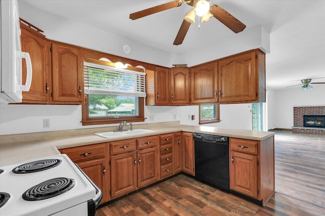 2506 S Cottage Grove Ave, Urbana, IL 61801 - kitchen with white appliances, ceiling fan, a sink, and brown cabinets