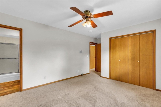 2506 S Cottage Grove Ave, Urbana, IL 61801 - unfurnished bedroom featuring carpet floors, a closet, baseboards, and ceiling fan