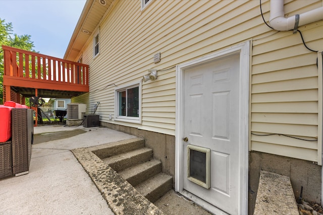 24221 S Edwin Dr, Channahon, IL 60410 - entrance to property with a deck and a patio
