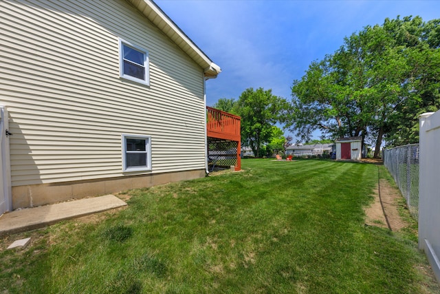 24221 S Edwin Dr, Channahon, IL 60410 - view of yard with a storage shed and a wooden deck