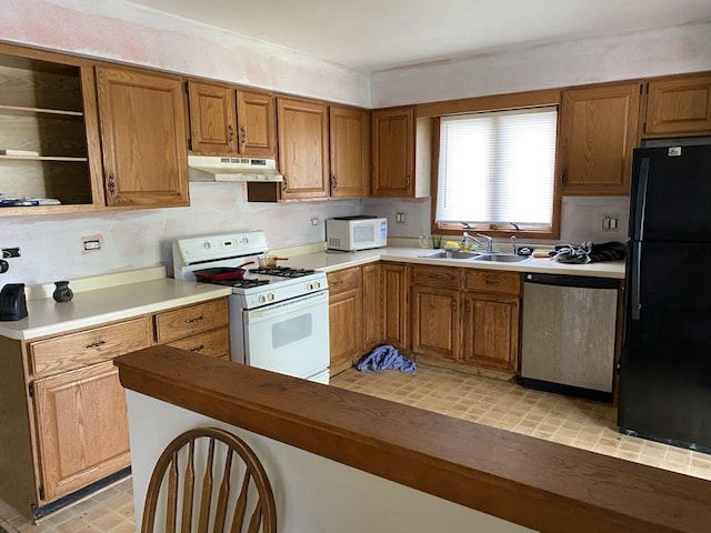 10607 Mathew St, Huntley, IL 60142 - kitchen featuring a sink, under cabinet range hood, brown cabinets, and white appliances
