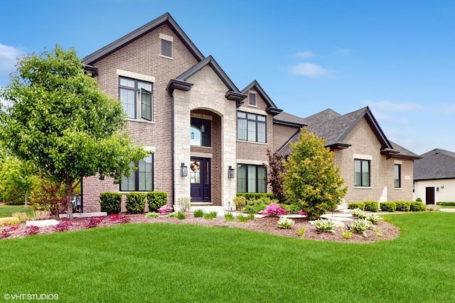 11050 Deer Haven Ln, Orland Park, IL 60467 - view of front of property with brick siding, a front yard, and stone siding