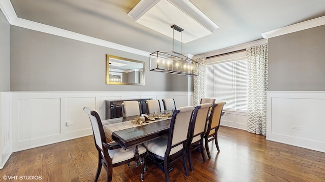 11050 Deer Haven Ln, Orland Park, IL 60467 - dining area featuring crown molding, wainscoting, wood finished floors, a decorative wall, and a chandelier