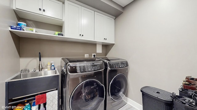 11050 Deer Haven Ln, Orland Park, IL 60467 - clothes washing area featuring washer and clothes dryer, cabinet space, baseboards, and wood finished floors