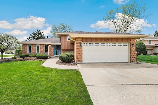 view of front of house featuring an attached garage, concrete driveway, brick siding, and a front yard