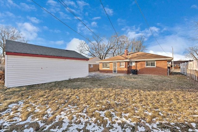 689 E 155th St, South Holland, IL 60473 - back of house with fence, a chimney, central air condition unit, and brick siding
