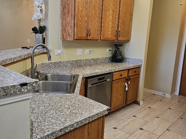 2186 Shadow Creek Ct N, Vernon Hills, IL 60061 - kitchen featuring stainless steel dishwasher, a sink, brown cabinets, and light countertops