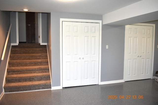 stairs featuring baseboards