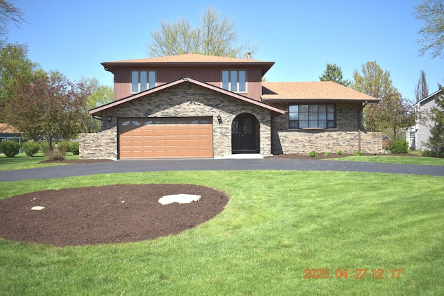 view of front of house with stone siding, driveway, and a front yard