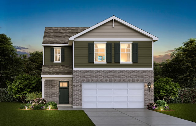 view of front of property featuring concrete driveway, an attached garage, a yard, brick siding, and a shingled roof