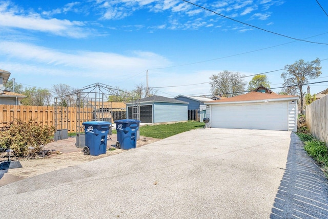 detached garage with fence