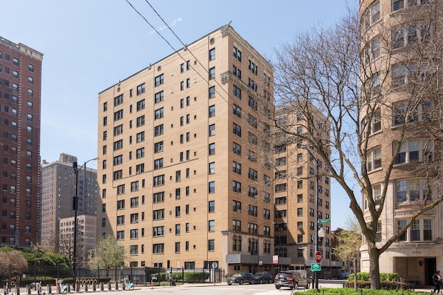 1755 E 55th St Unit 1102, Chicago, IL 60615 - view of property featuring fence