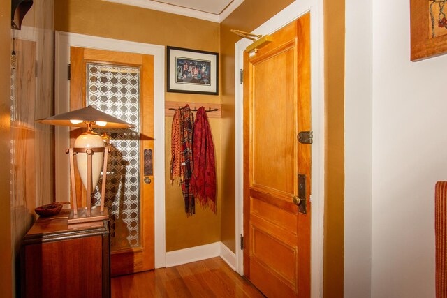 1755 E 55th St Unit 1102, Chicago, IL 60615 - interior space with wood finished floors, ornamental molding, and baseboards