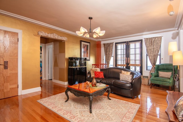 1755 E 55th St Unit 1102, Chicago, IL 60615 - living area featuring wood finished floors, ornamental molding, a notable chandelier, and baseboards