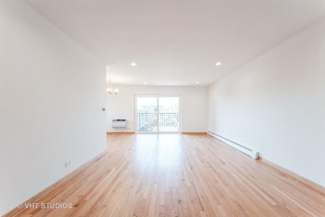 unfurnished living room with a baseboard radiator, a chandelier, recessed lighting, and light wood-style floors