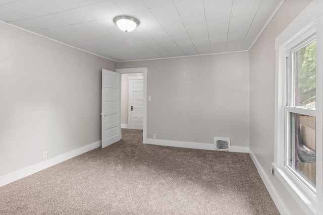 510 S Cottage Grove Ave, Urbana, IL 61802 - empty room featuring carpet floors and crown molding