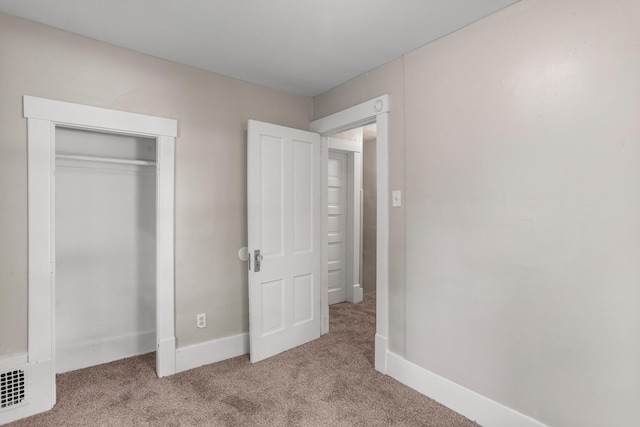 510 S Cottage Grove Ave, Urbana, IL 61802 - unfurnished bedroom with carpet and a closet
