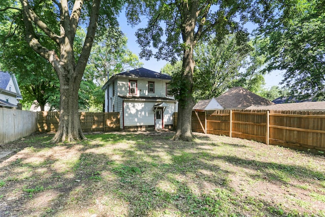 510 S Cottage Grove Ave, Urbana, IL 61802 - rear view of house with a fenced backyard