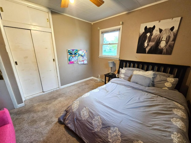 bedroom featuring ceiling fan, baseboards, ornamental molding, and carpet floors