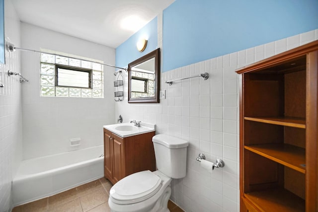 405 E 109th St Unit 203, Chicago, IL 60628 - bathroom with tile walls,  shower combination, vanity, and tile patterned flooring