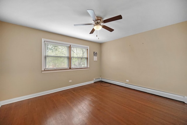 405 E 109th St Unit 203, Chicago, IL 60628 - spare room featuring a baseboard radiator, wood finished floors, and ceiling fan