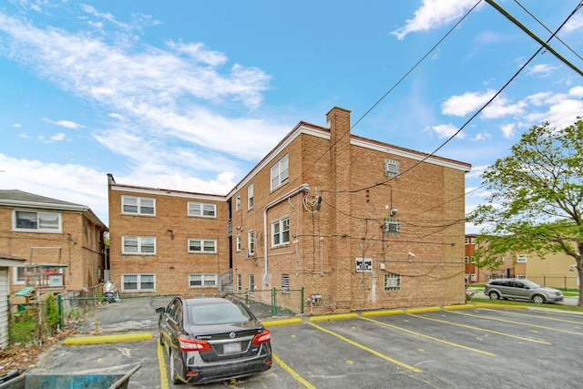405 E 109th St Unit 203, Chicago, IL 60628 - view of property featuring uncovered parking