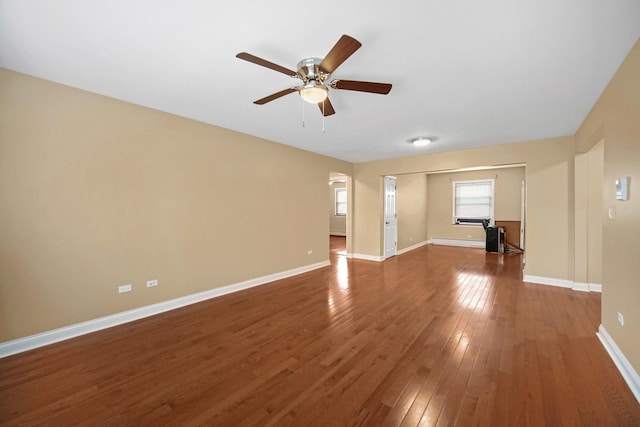 405 E 109th St Unit 203, Chicago, IL 60628 - unfurnished living room with hardwood / wood-style floors and a ceiling fan