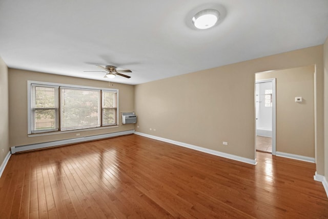 405 E 109th St Unit 203, Chicago, IL 60628 - empty room featuring baseboard heating, ceiling fan, light wood finished floors, and a wall mounted AC