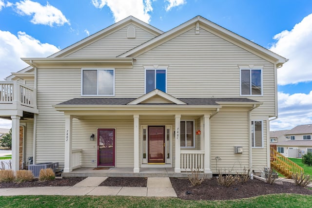 7480 Thomas Dr Unit 7480, Loves Park, IL 61111 - view of front of home featuring covered porch and central air condition unit