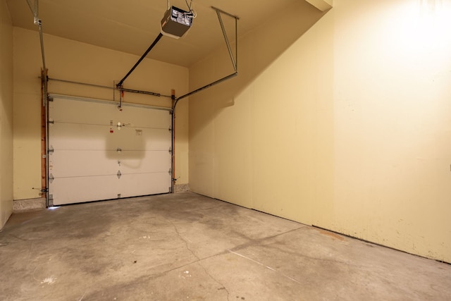 7480 Thomas Dr Unit 7480, Loves Park, IL 61111 - garage featuring a garage door opener