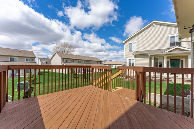 7480 Thomas Dr Unit 7480, Loves Park, IL 61111 - wooden deck with a residential view and a yard