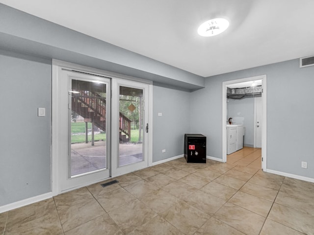 interior space with visible vents, baseboards, and light tile patterned flooring
