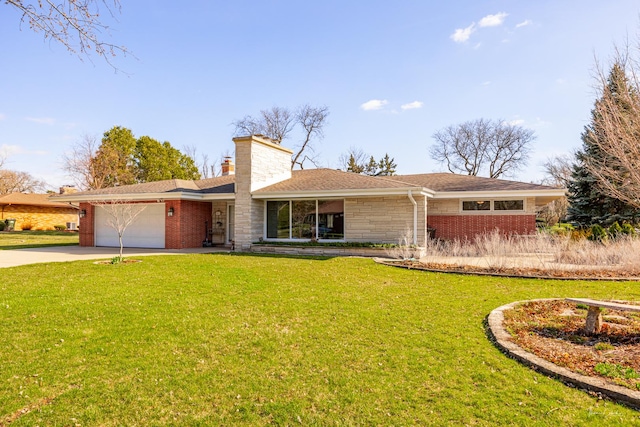 view of front of property with driveway, a front lawn, brick siding, and an attached garage