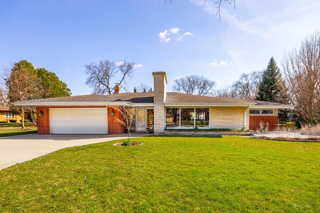 single story home featuring driveway, a chimney, an attached garage, brick siding, and a front lawn