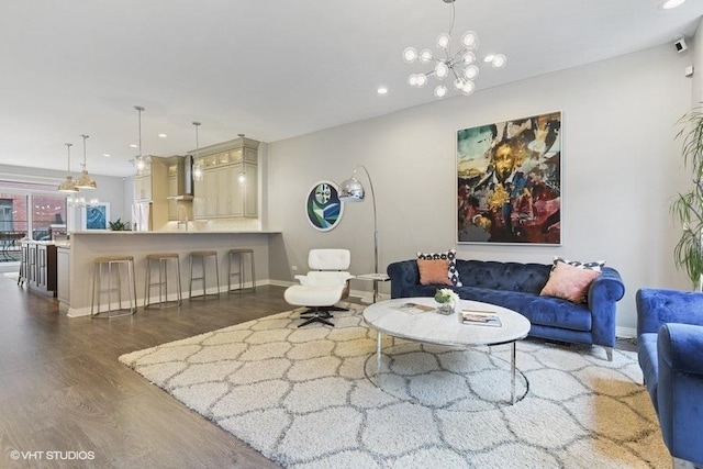 living area with baseboards, recessed lighting, a chandelier, and dark wood-style floors