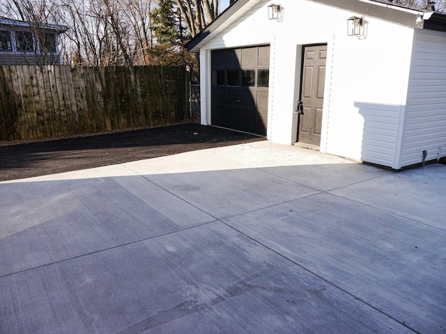 garage featuring fence
