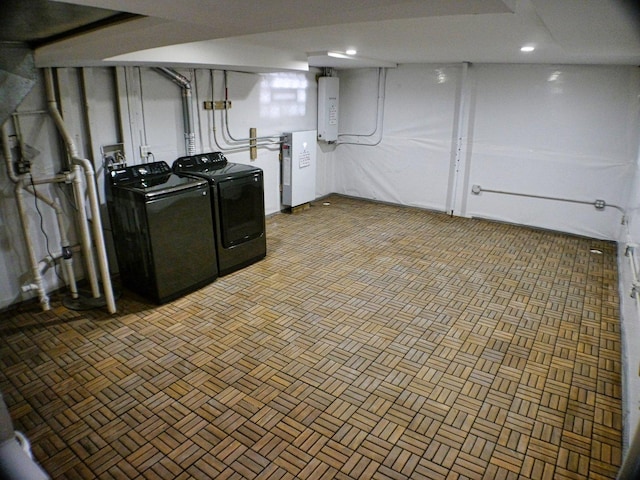 finished below grade area with independent washer and dryer, recessed lighting, and electric panel