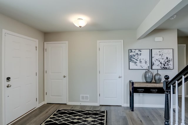 800 Cloverleaf Dr, Marengo, IL 60152 - foyer entrance featuring baseboards, visible vents, and wood finished floors