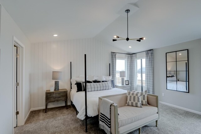 800 Cloverleaf Dr, Marengo, IL 60152 - bedroom with ceiling fan with notable chandelier, carpet flooring, lofted ceiling, and baseboards