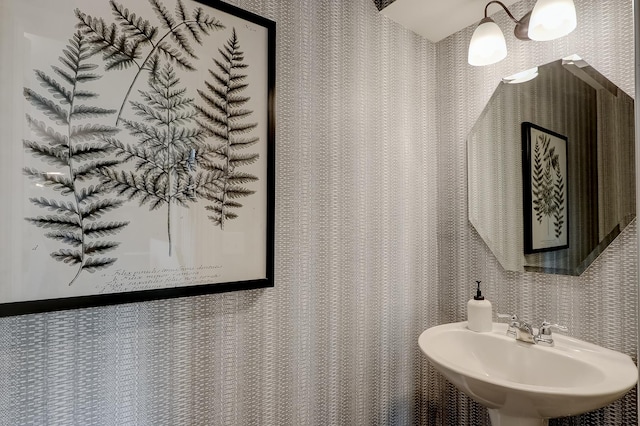 800 Cloverleaf Dr, Marengo, IL 60152 - bathroom with a sink and wallpapered walls