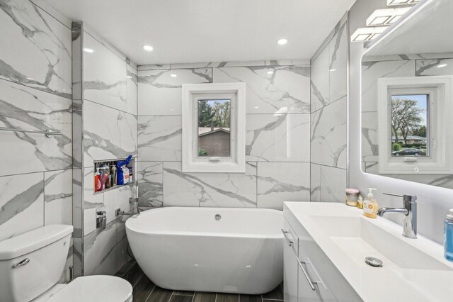 11702 Center Dr, Lemont, IL 60439 - full bathroom with tile walls, toilet, vanity, and a freestanding tub