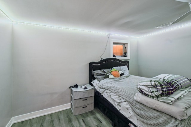 11702 Center Dr, Lemont, IL 60439 - bedroom with baseboards and wood finished floors