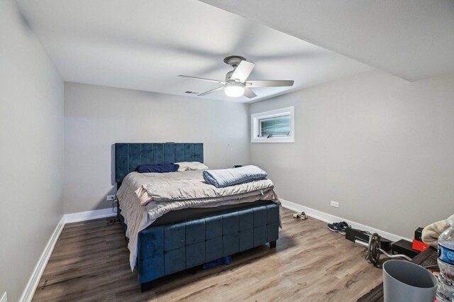 11702 Center Dr, Lemont, IL 60439 - bedroom featuring wood finished floors, baseboards, and ceiling fan